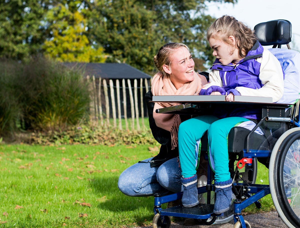mother with daughter in a wheelchair